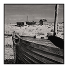 two boats and sheds