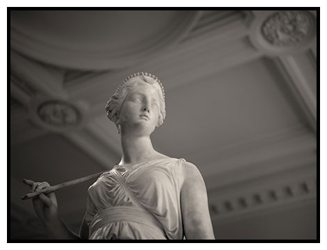 statue bathed in wondowlight