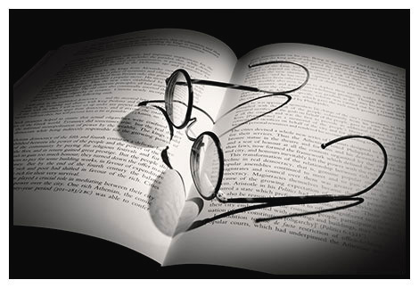 spectacles and book